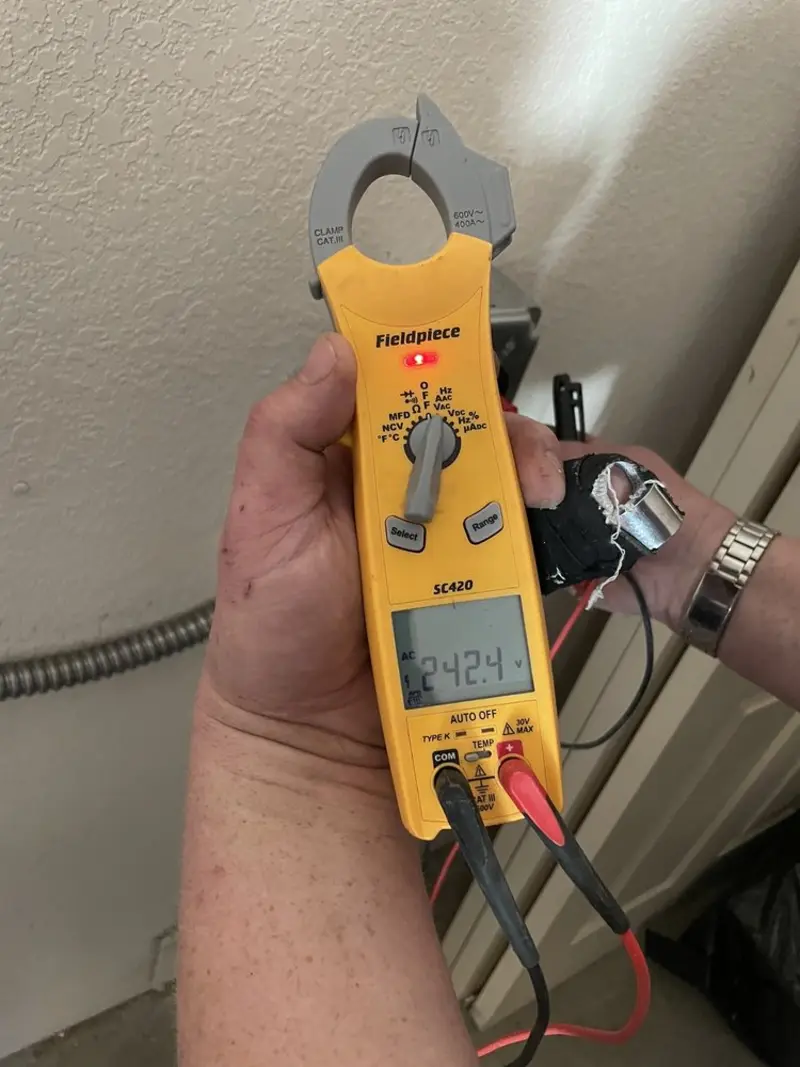 Voltage testing with clamp meter during Generator Installation in Rapid Valley